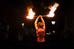 man demonstrating fire dance